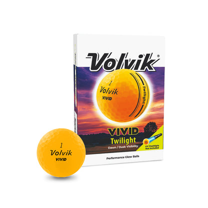 Orange Volvik Vivid golf ball with packaging on a white background