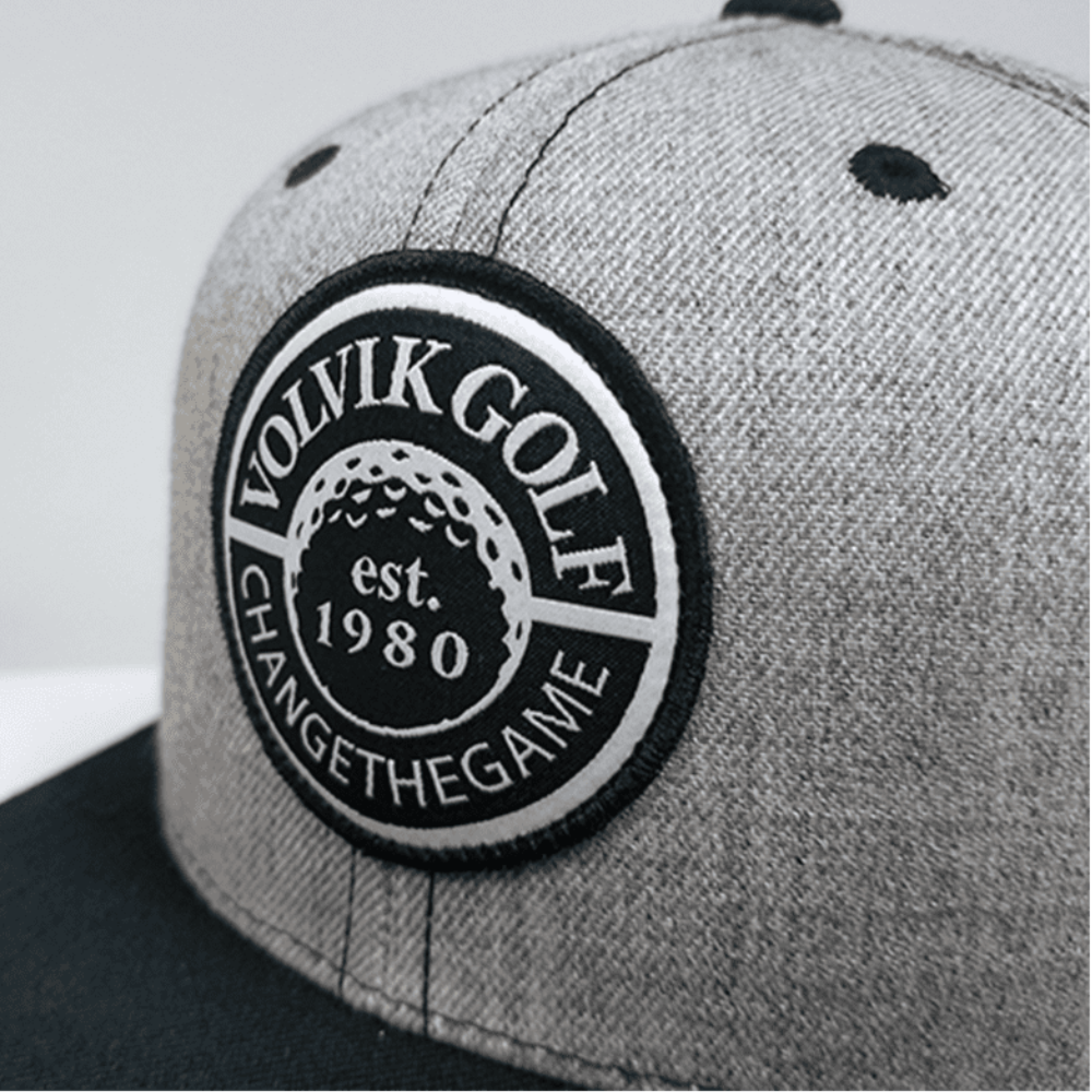 Gray cap with Volvik Golf logo featuring a golf ball design.