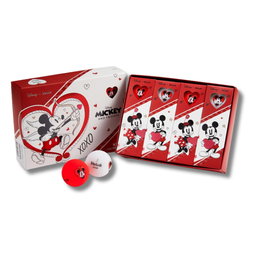 A set of golf balls with Disney characters Mickey and Minnie Mouse branding, presented with red and white themed packaging and decorations.